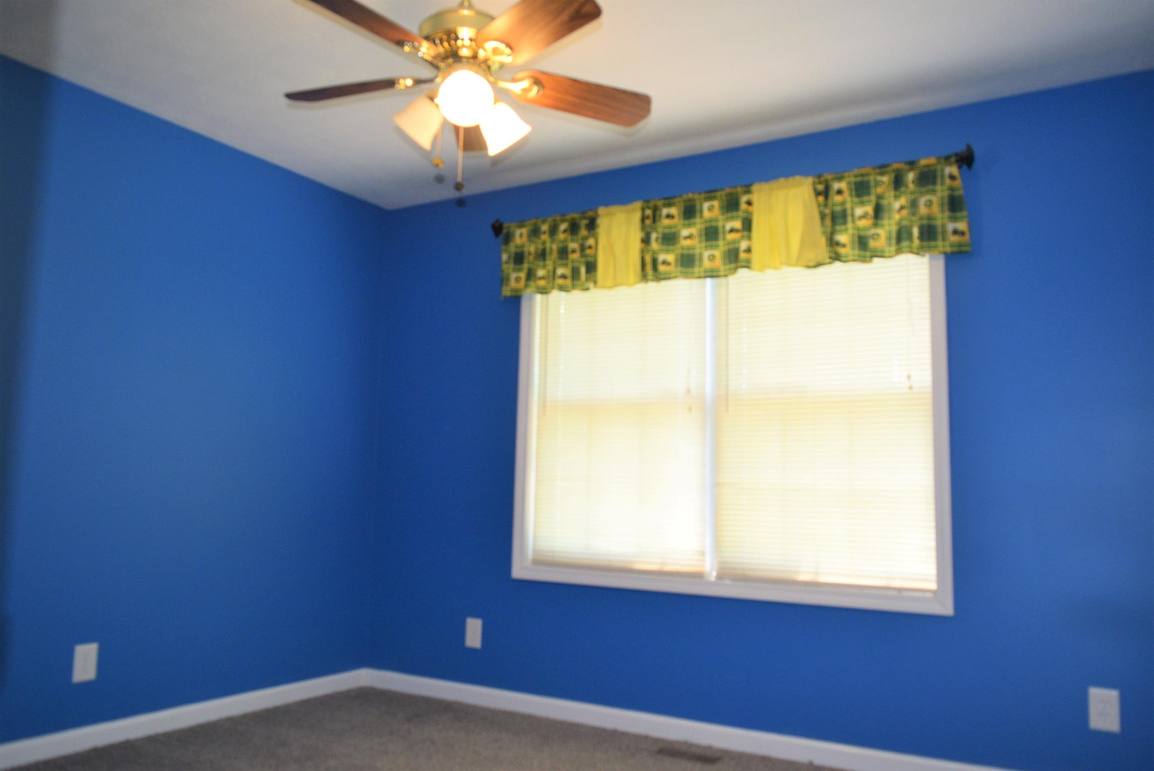 4893 Albright Road Clarksville, TN 37043 - Photo 13 of 20 One of the extra bedrooms, this one has a walk-in closet.