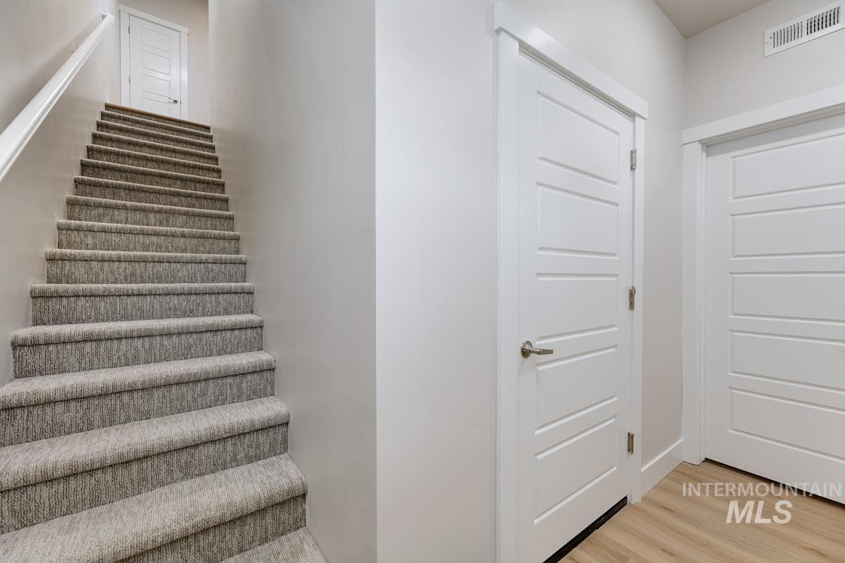 2281-2299 North Shaelyn Lane Boise, ID 83713 - Photo 26 of 29 Stairway with wood finished floors