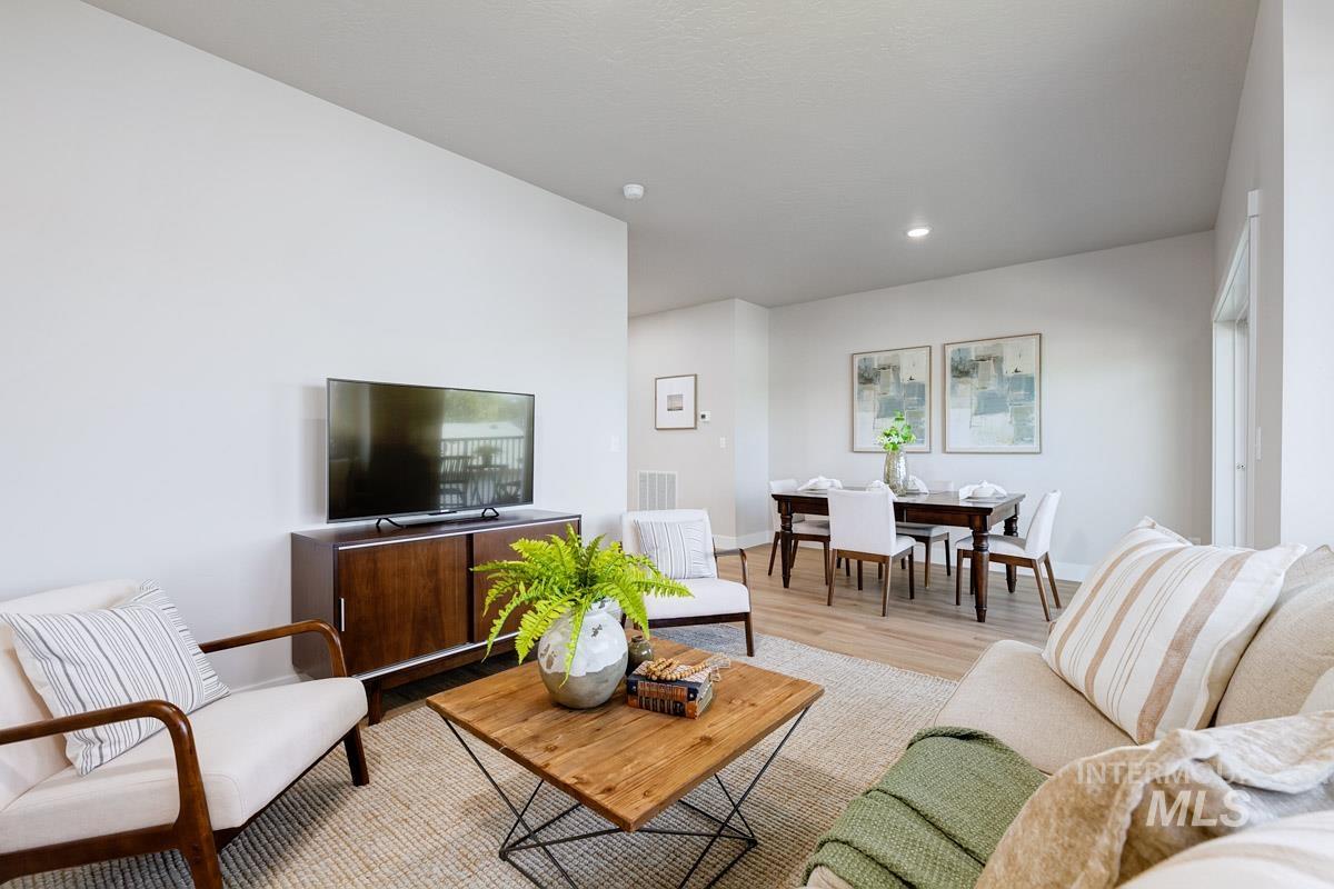 2281-2299 North Shaelyn Lane Boise, ID 83713 - Photo 6 of 29 Living area with wood finished floors and baseboards