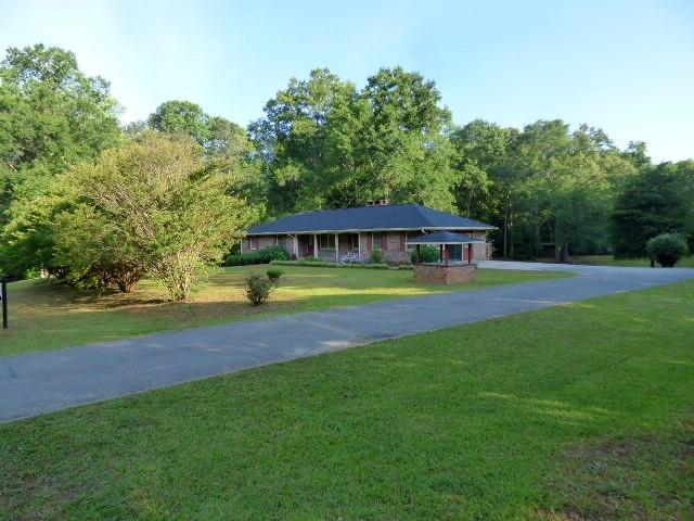 2000 Snows Mill Road Monroe, GA 30655 - Photo 1 of 1 a view of house with a swimming pool