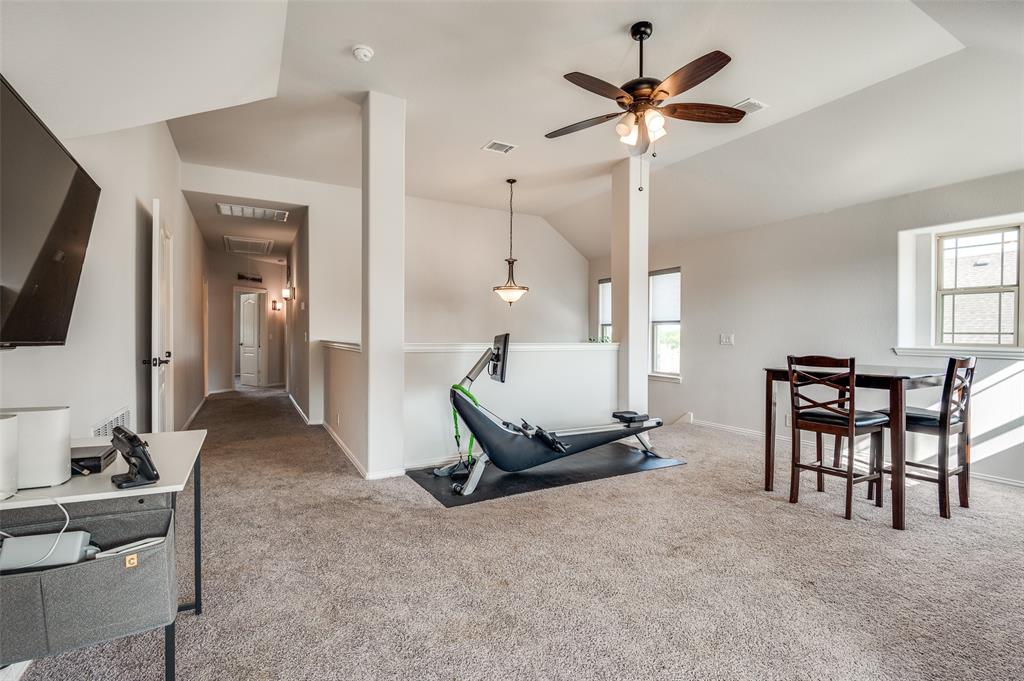 4609 Massey Meadows Way Midlothian, TX 76065 - Photo 13 of 25 a living room with furniture and a flat screen tv