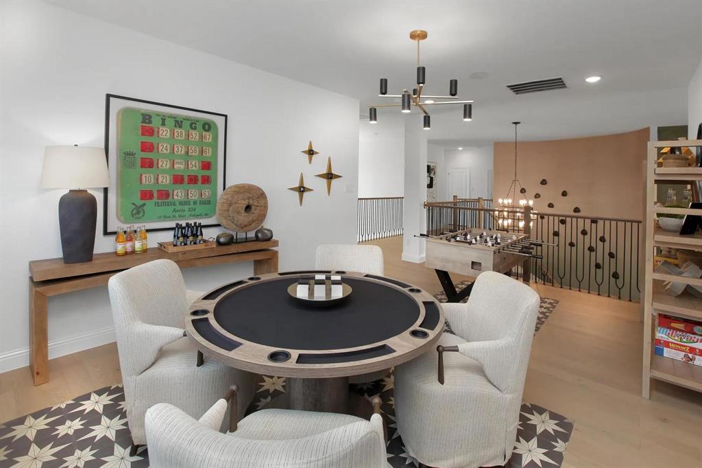 317 Bee Balm Road McKinney, TX 75071 - Photo 12 of 24 a kitchen with a table and chairs in it