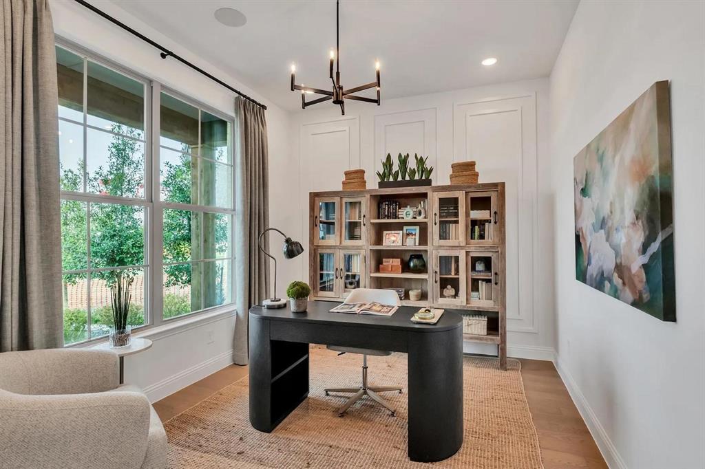 317 Bee Balm Road McKinney, TX 75071 - Photo 13 of 24 a view of a livingroom with furniture and window