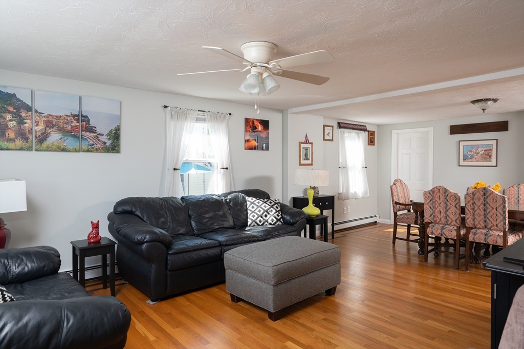 29 Wituwamat Road Weymouth, MA 02191 - Photo 21 of 42 a living room with furniture and wooden floor