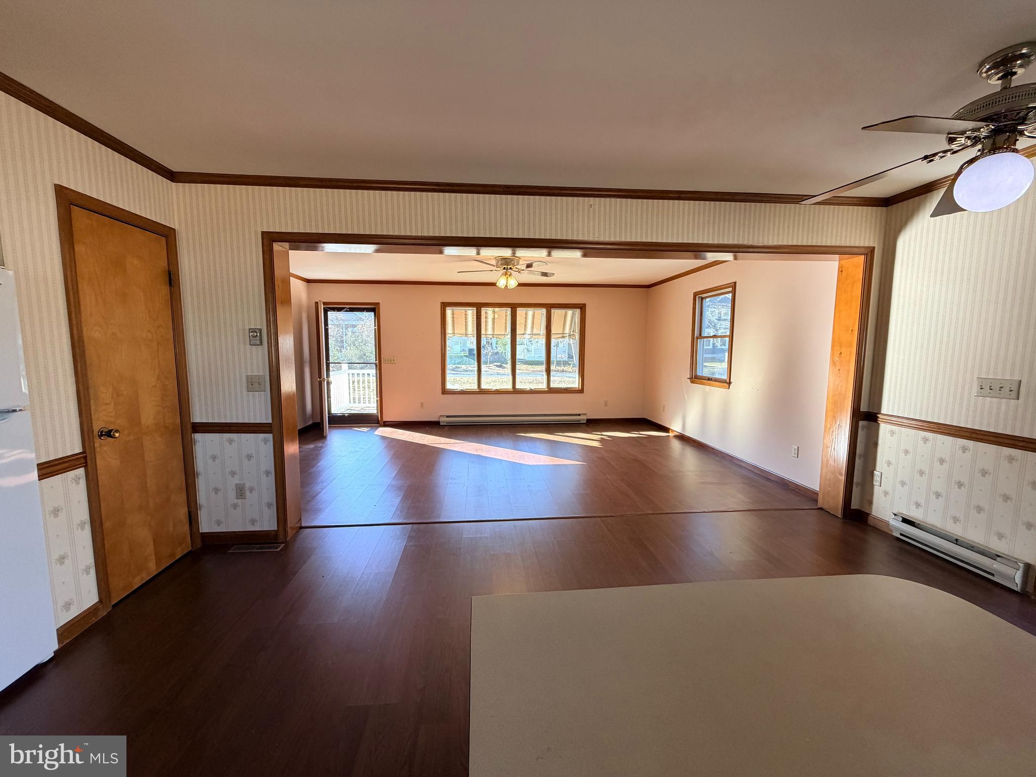 31461 Hope Street Ocean View, DE 19970 - Photo 12 of 20 wooden floor in an empty room with a window