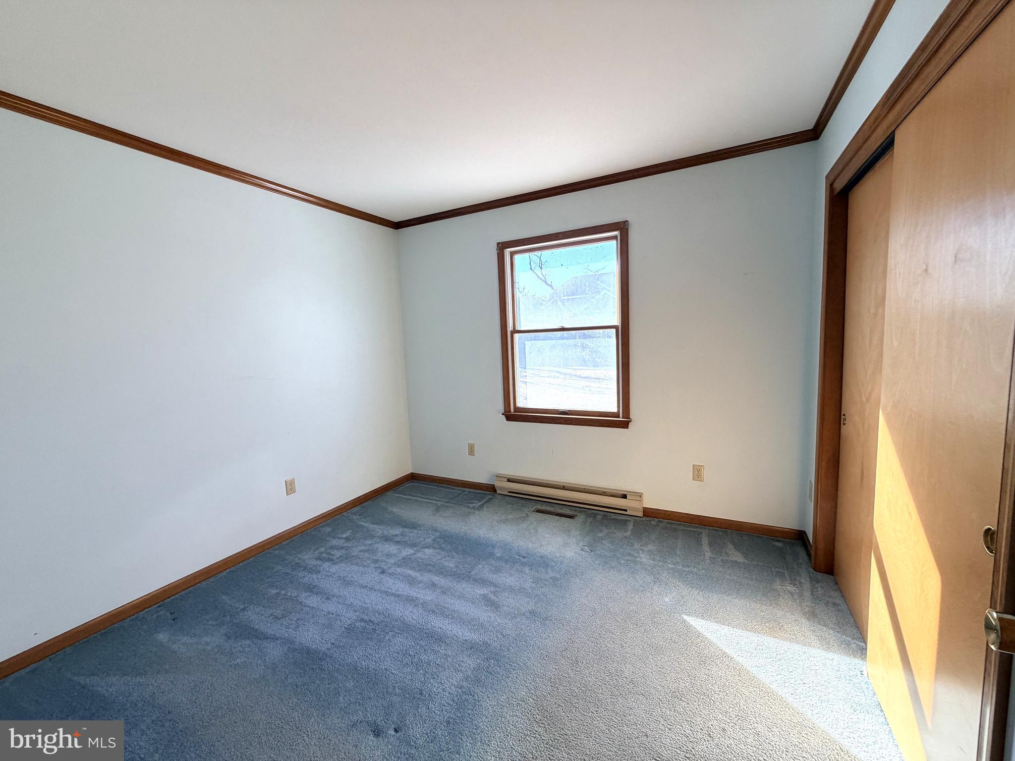 31461 Hope Street Ocean View, DE 19970 - Photo 16 of 20 an empty room with windows