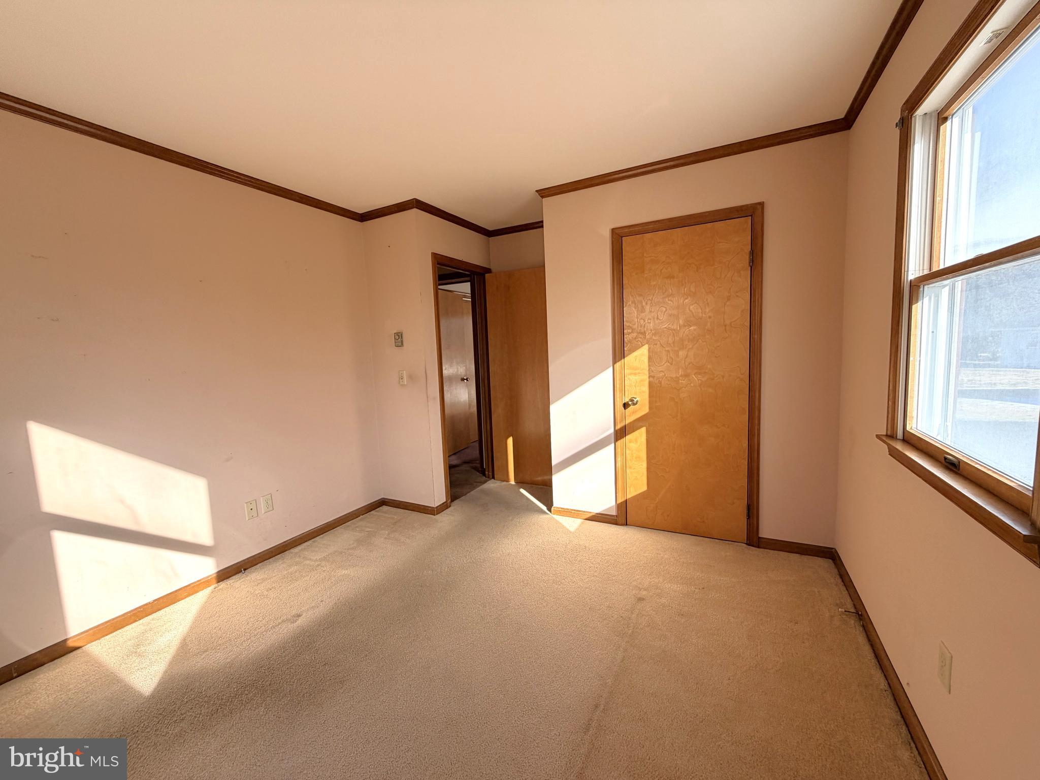 31461 Hope Street Ocean View, DE 19970 - Photo 20 of 20 a view of an empty room with a window