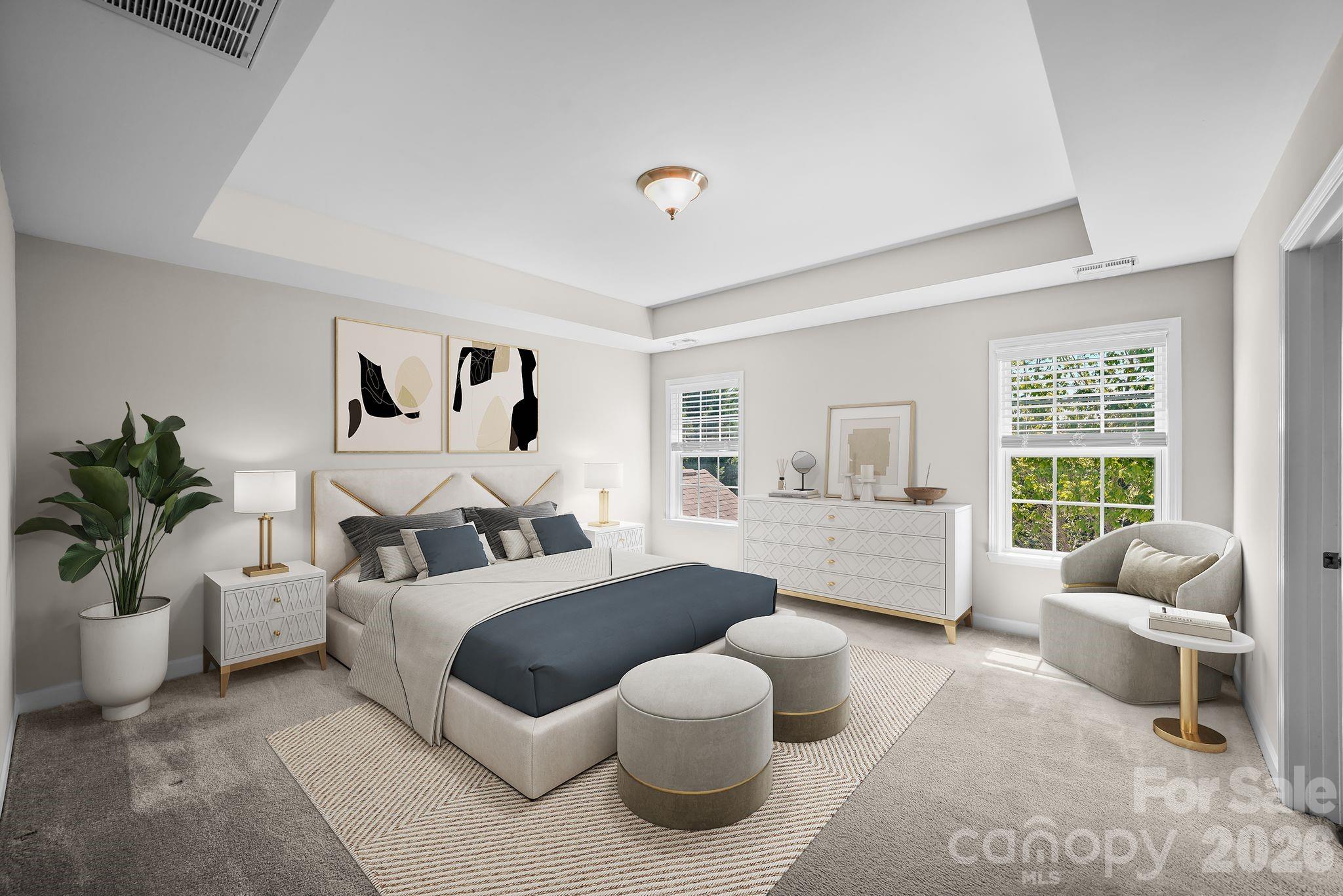 5072 Gladiola Way Tega Cay, SC 29708 - Photo 19 of 40 a bedroom with a bed and ceiling fan