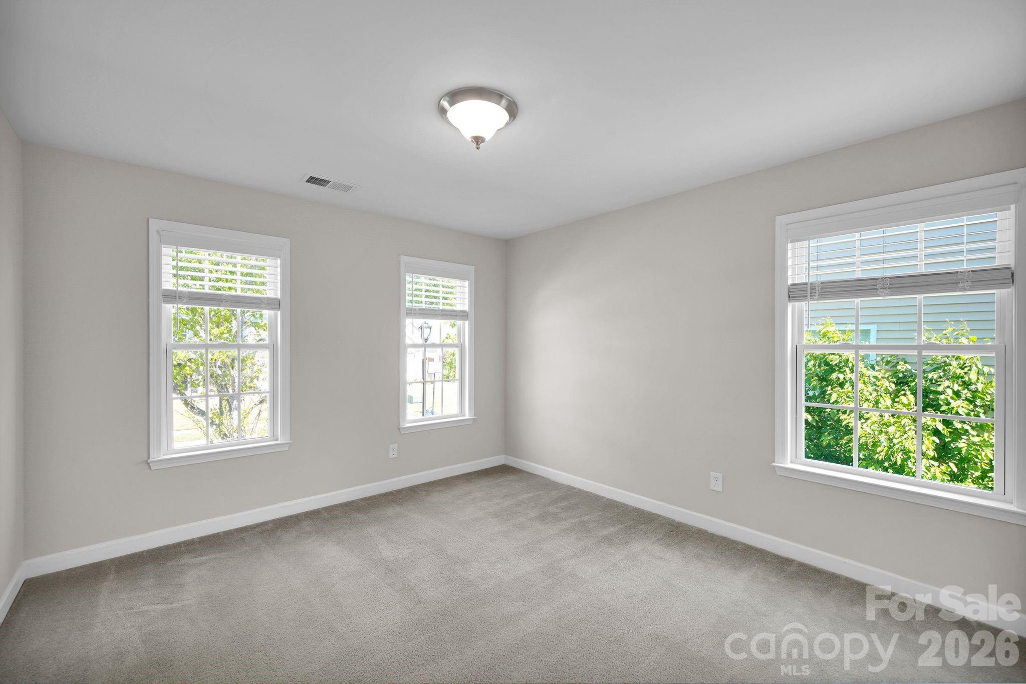 5072 Gladiola Way Tega Cay, SC 29708 - Photo 29 of 40 a view of an empty room with a window