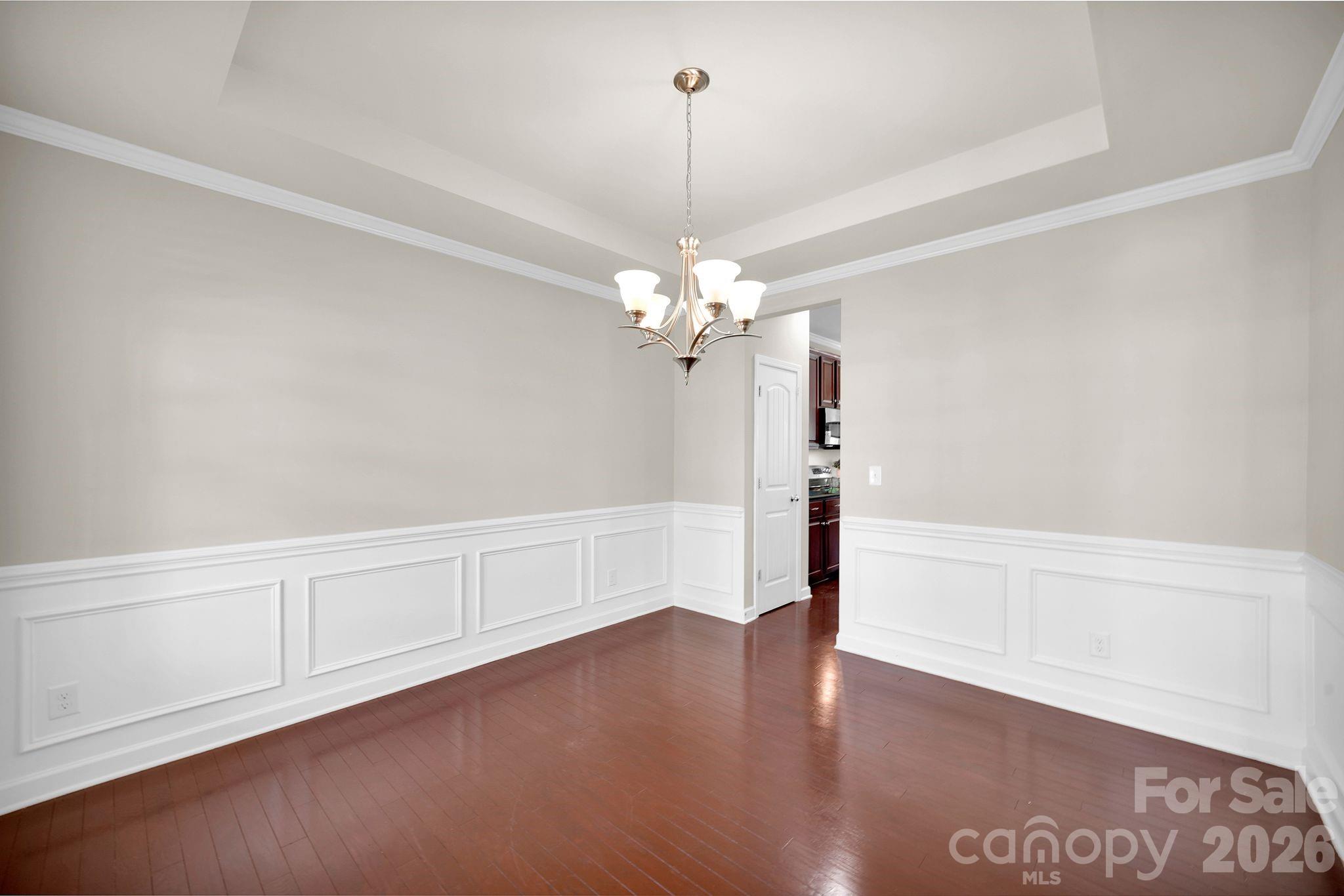 5072 Gladiola Way Tega Cay, SC 29708 - Photo 5 of 40 a view of a chandelier in a room