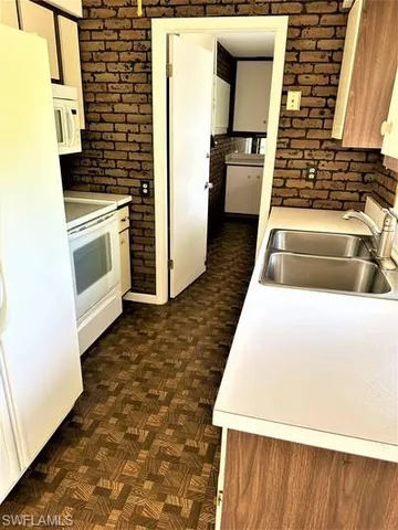 $1,450 | 223 Punta Alta Court, Lehigh Acres, FL 33936