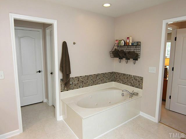 7732 Silver View Lane Raleigh, NC 27613 - Photo 11 of 25 Whirlpool tub. Not pictured is separate shower! Master Bath/Spa