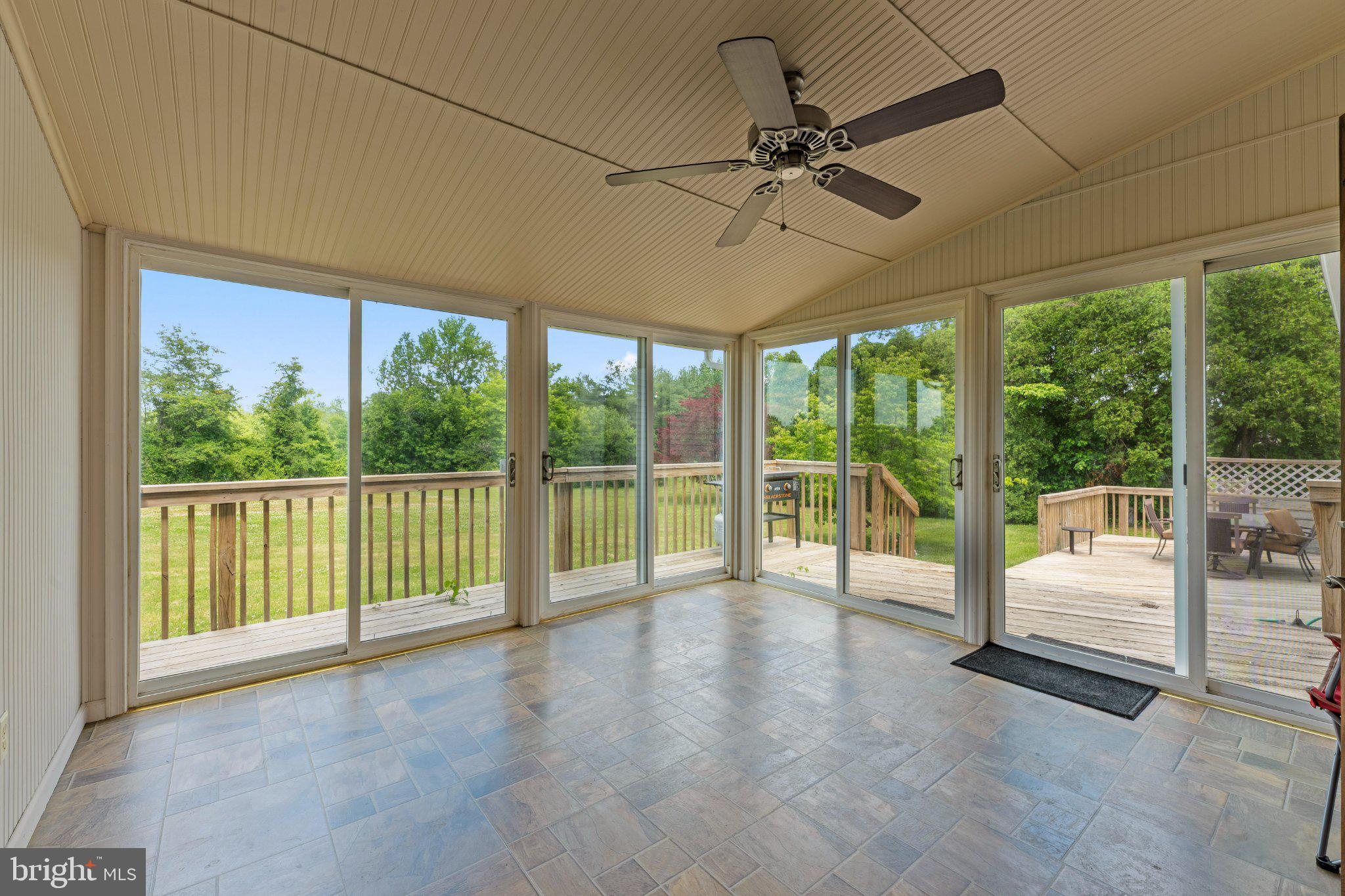607 Chesterfield Arneytown Road Chesterfield, NJ 08515 - Photo 18 of 57 Bright sunroom with serene views.