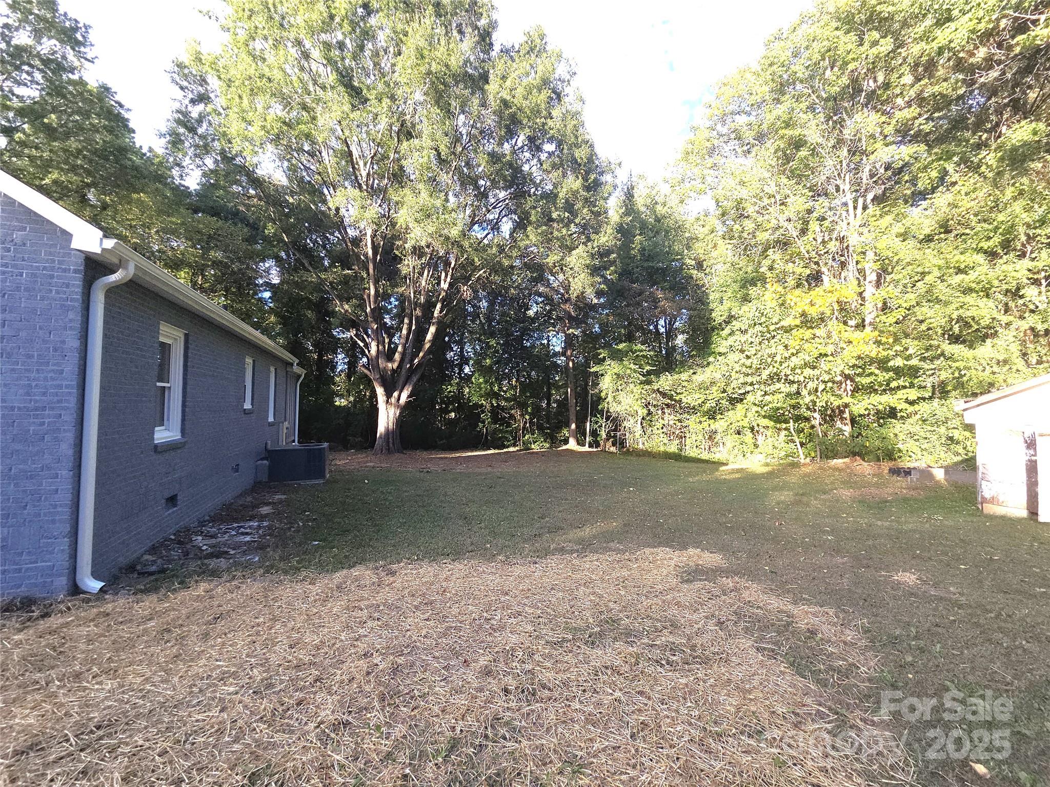 4750 J W Cline Road Kannapolis, NC 28083 - Photo 16 of 16 a view of a house with a tree