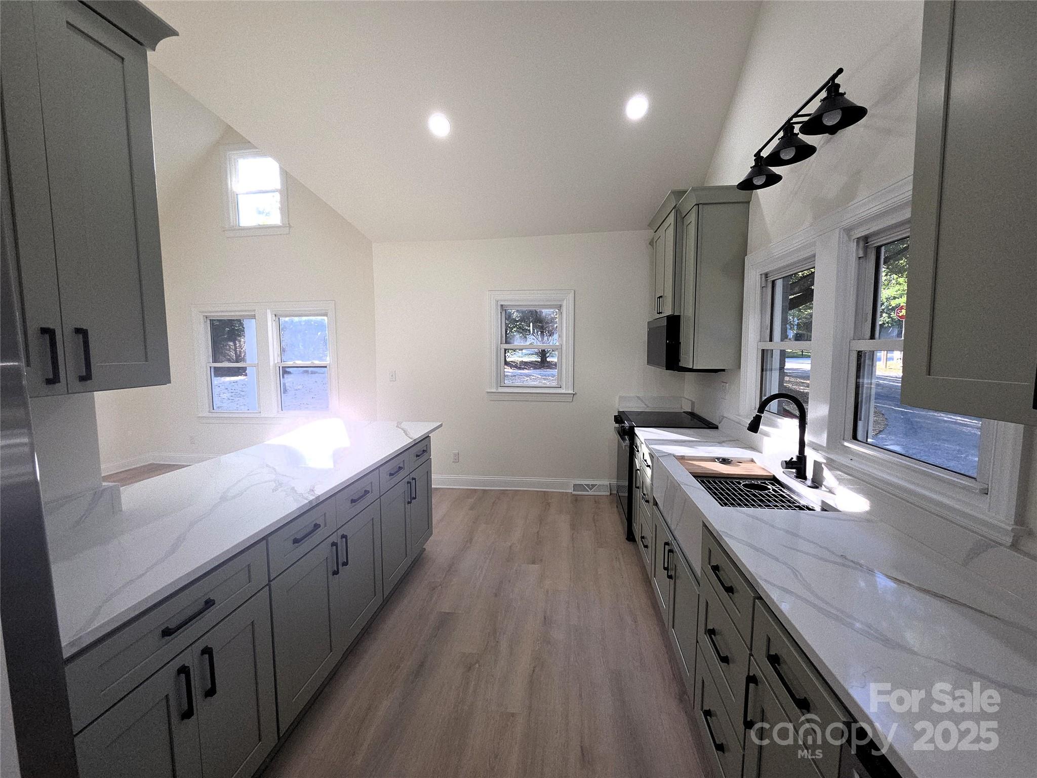 4750 J W Cline Road Kannapolis, NC 28083 - Photo 8 of 16 a kitchen with sink stove and refrigerator
