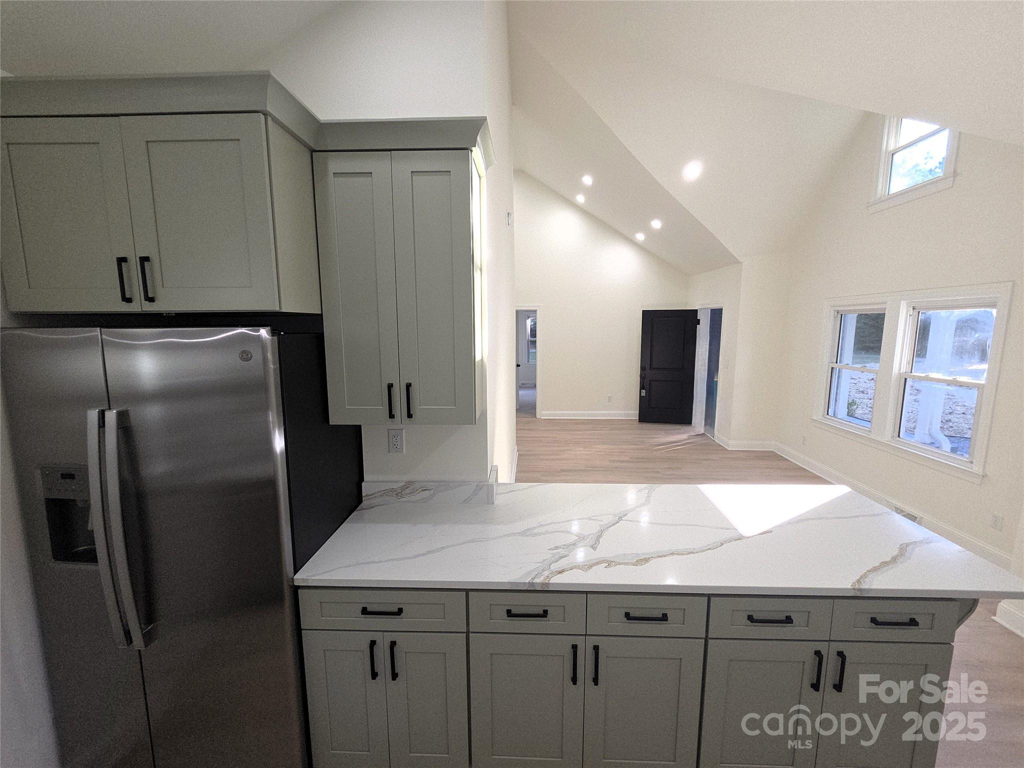 4750 J W Cline Road Kannapolis, NC 28083 - Photo 9 of 16 a kitchen with stainless steel appliances granite countertop a refrigerator and a sink
