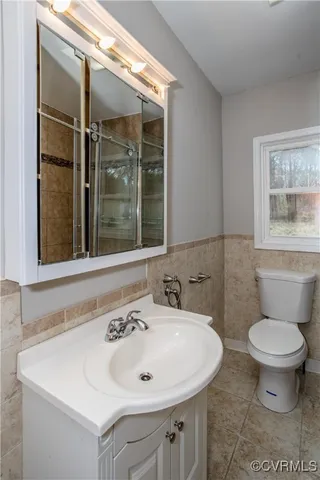 a bathroom with a sink and a toilet