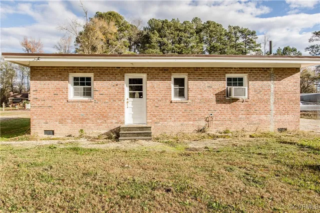 a view of a house with a large window