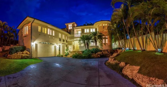 a view of a building with a yard