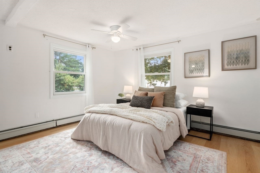 10 Temi Road Chelmsford, MA 01824 - Photo 11 of 22 a bedroom with a bed and a window