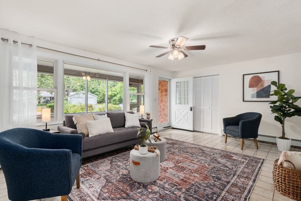 10 Temi Road Chelmsford, MA 01824 - Photo 2 of 22 a living room with furniture and a large window