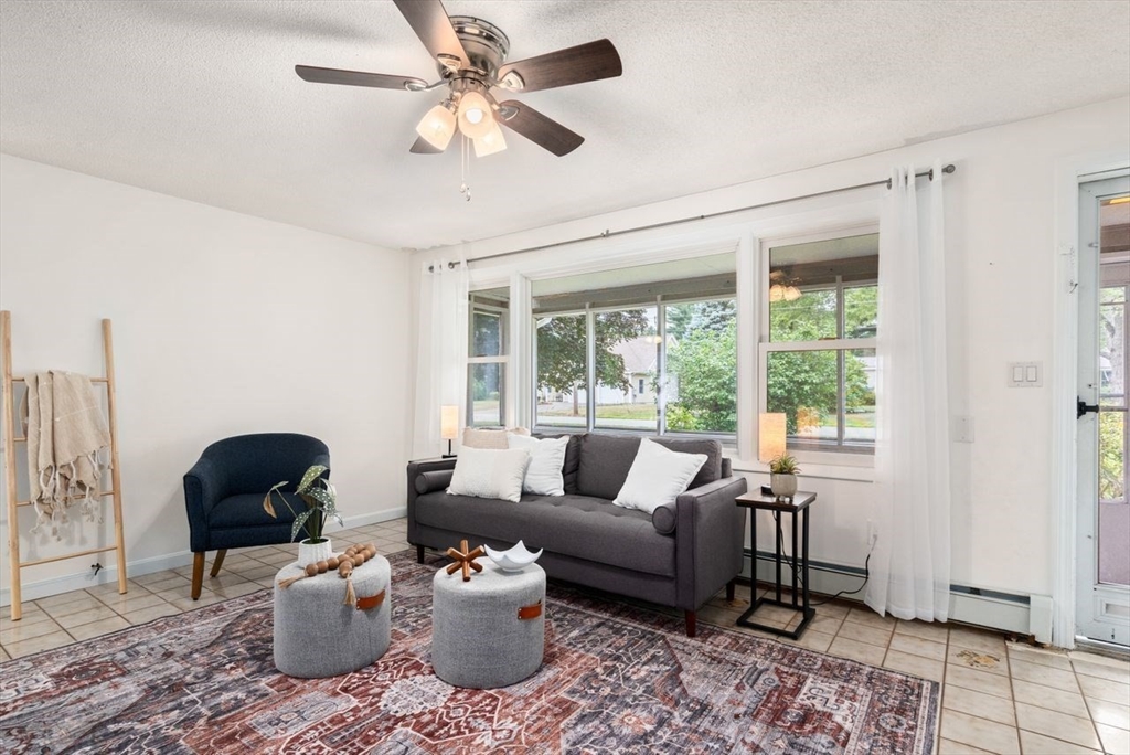 10 Temi Road Chelmsford, MA 01824 - Photo 3 of 22 a living room with furniture and a window