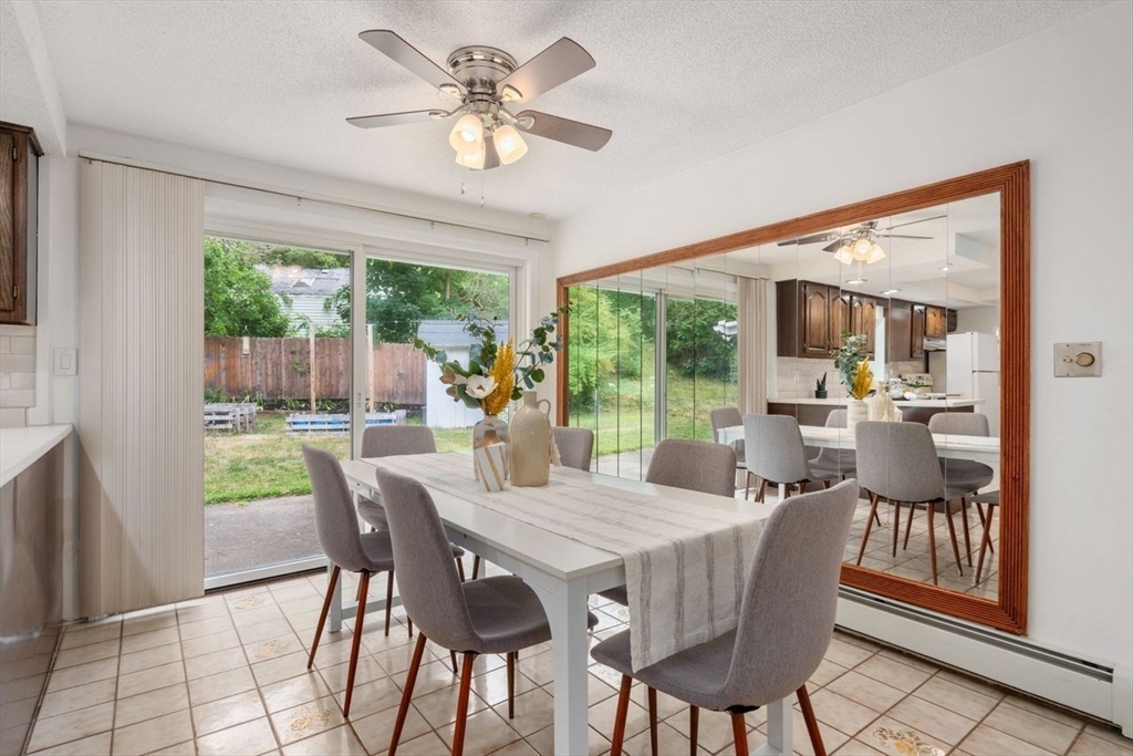 10 Temi Road Chelmsford, MA 01824 - Photo 5 of 22 a view of a dining room with furniture window and outside view