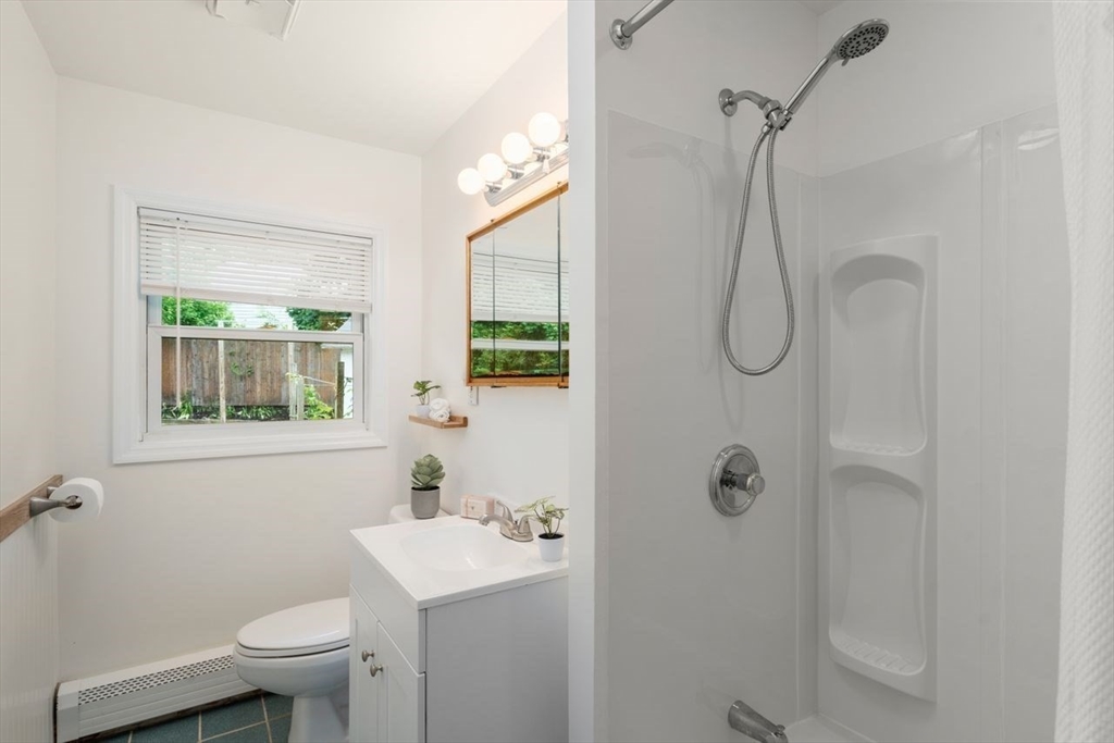 10 Temi Road Chelmsford, MA 01824 - Photo 9 of 22 a bathroom with a sink toilet and shower