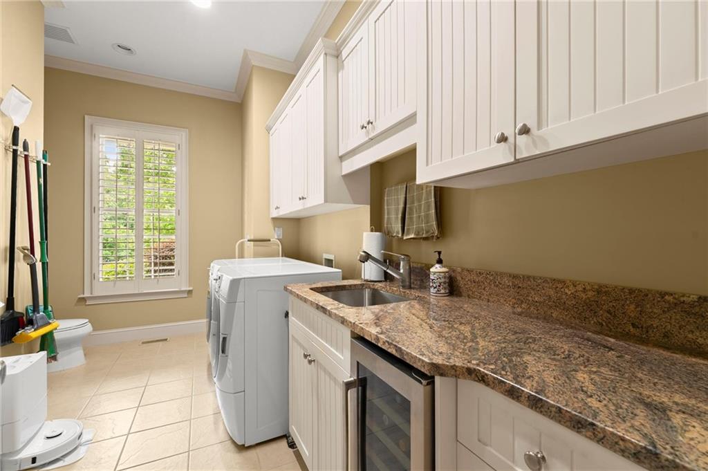 322 Edwards Brook Lane Canton, GA 30115 - Photo 35 of 99 a kitchen with a sink cabinets and window