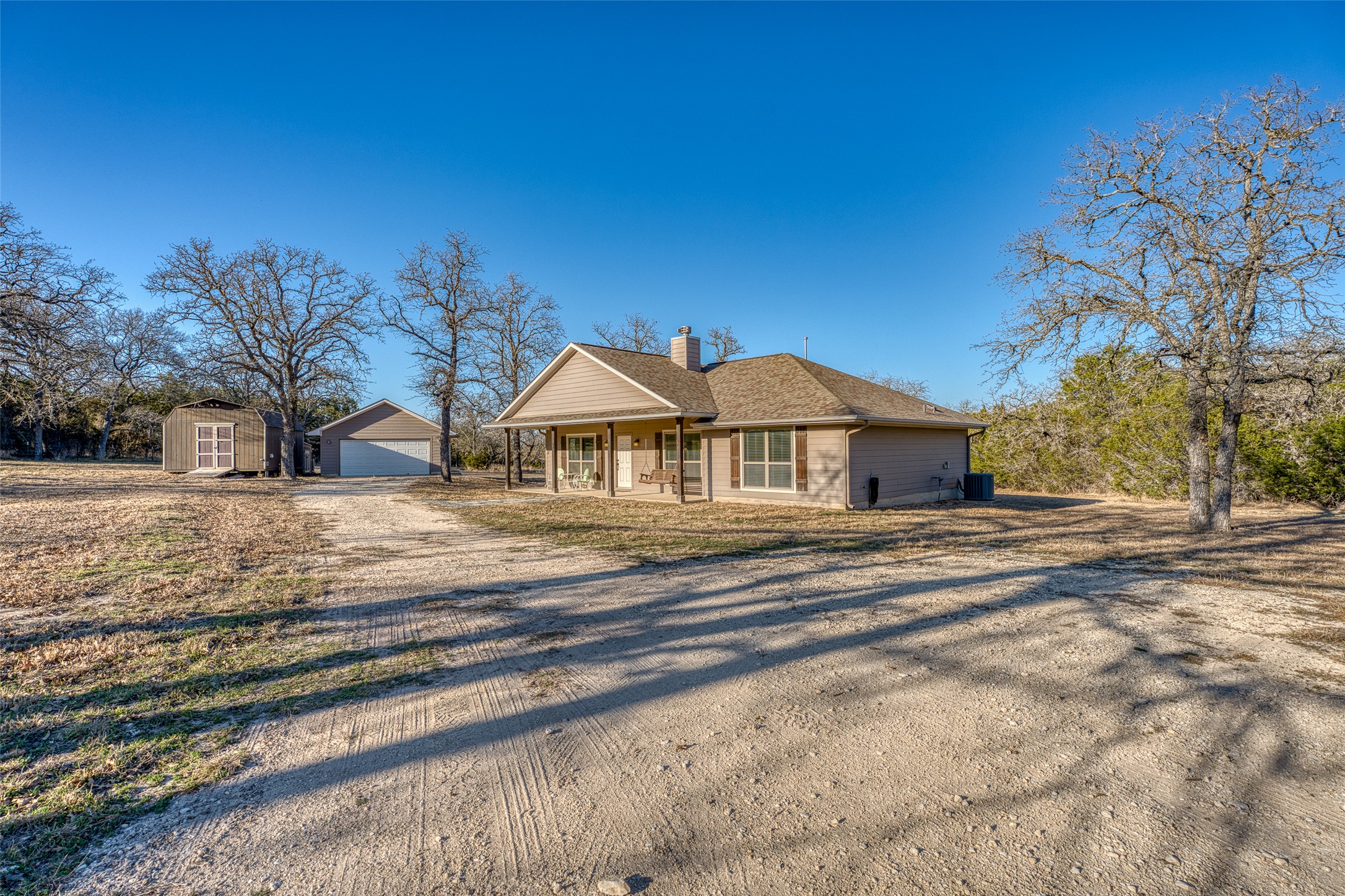 489 Nordic Ridge Road Bertram, TX 78605 - Photo 1 of 19 a view of house with outdoor space