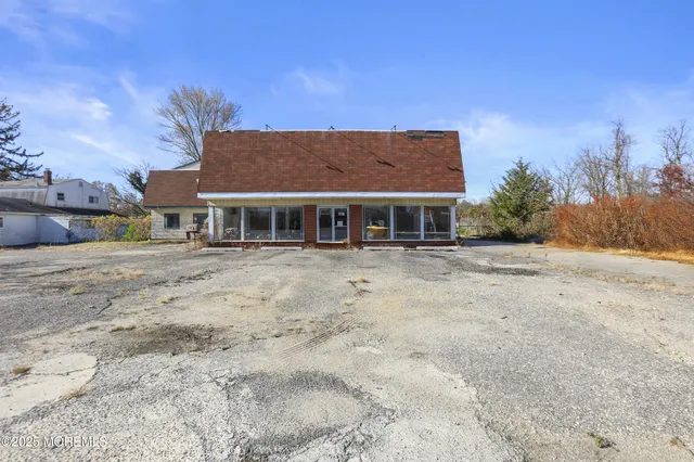 a house with yard in front of it
