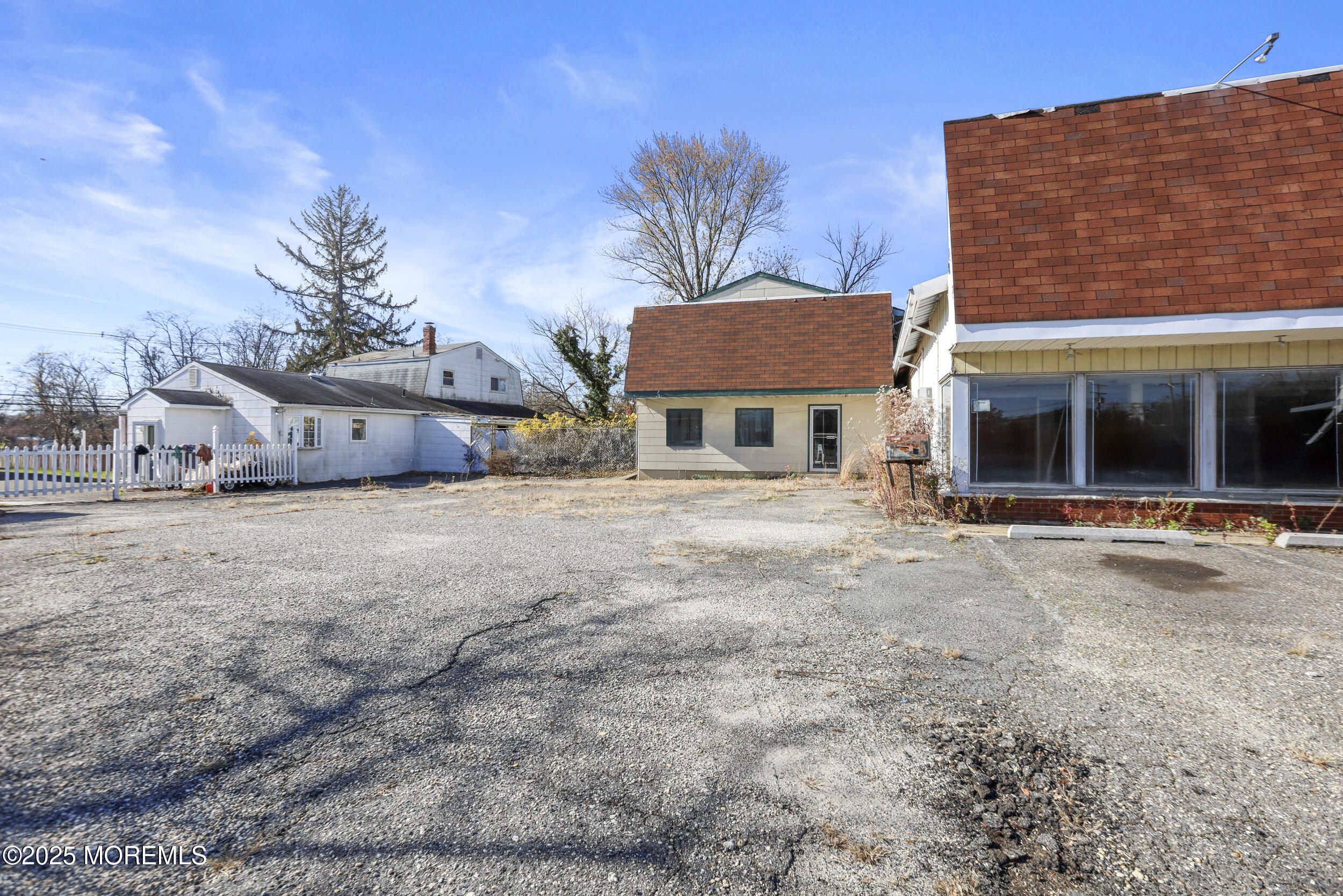 9 Us Highway Howell, NJ 07731 - Photo 3 of 9 a front view of a house with a yard