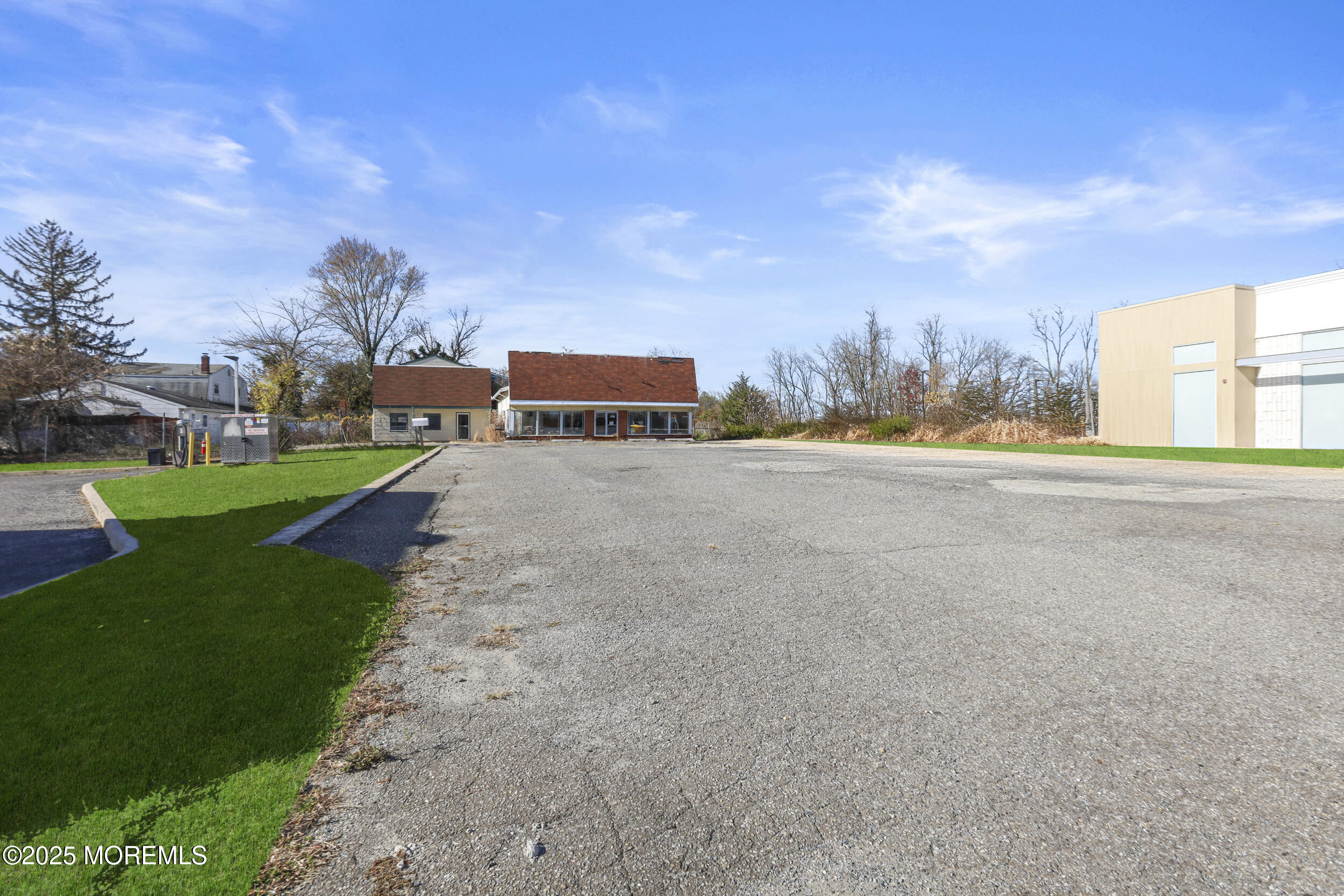 9 Us Highway Howell, NJ 07731 - Photo 6 of 9 a view of a street with houses in the background
