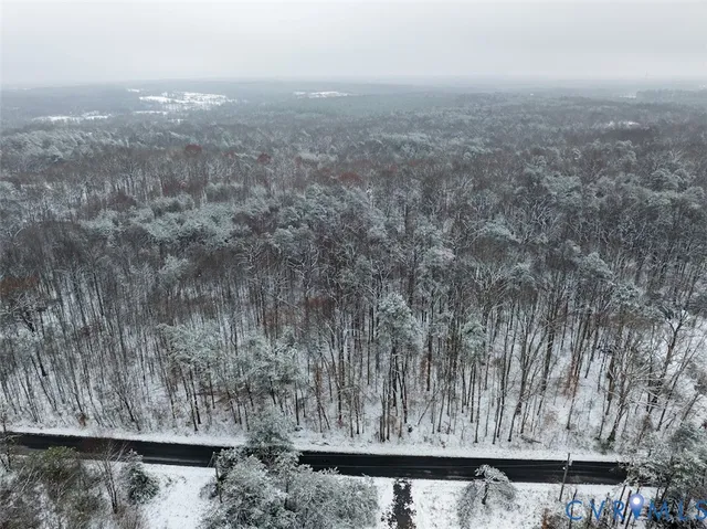 a view of roof with wooden fence