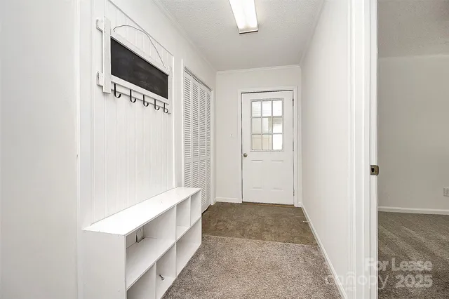 a view of hallway with washer and dryer