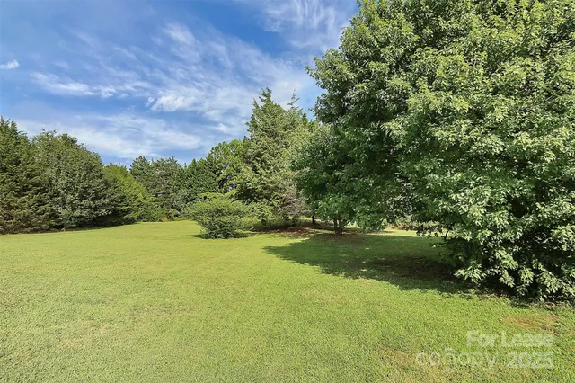 a view of outdoor space and yard