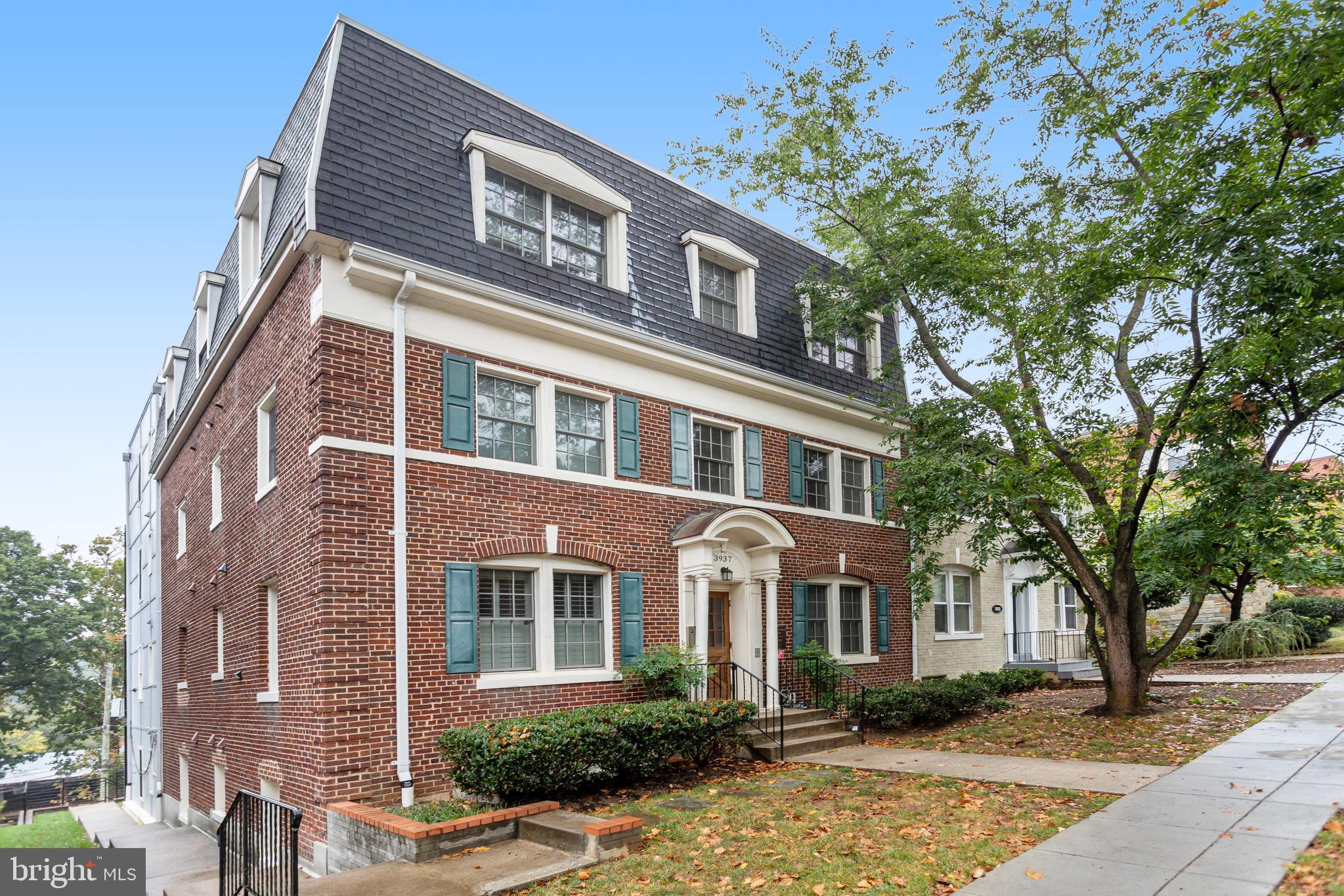 3937 Davis Place Northwest, Unit 1 Washington, DC 20007 - Photo 2 of 20 a front view of a house with a yard