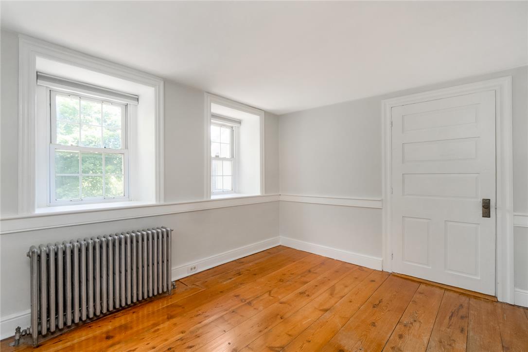 1325 Granger Road Northampton, PA 18067 - Photo 31 of 61 Warm wood floors and deep-set windows frame this naturally illuminated interior space.