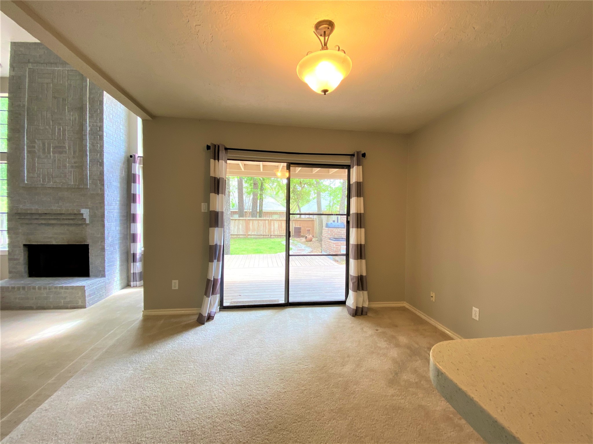 12303 Longfellow Drive Montgomery, TX 77356 - Photo 12 of 26 a view of a livingroom with a fireplace