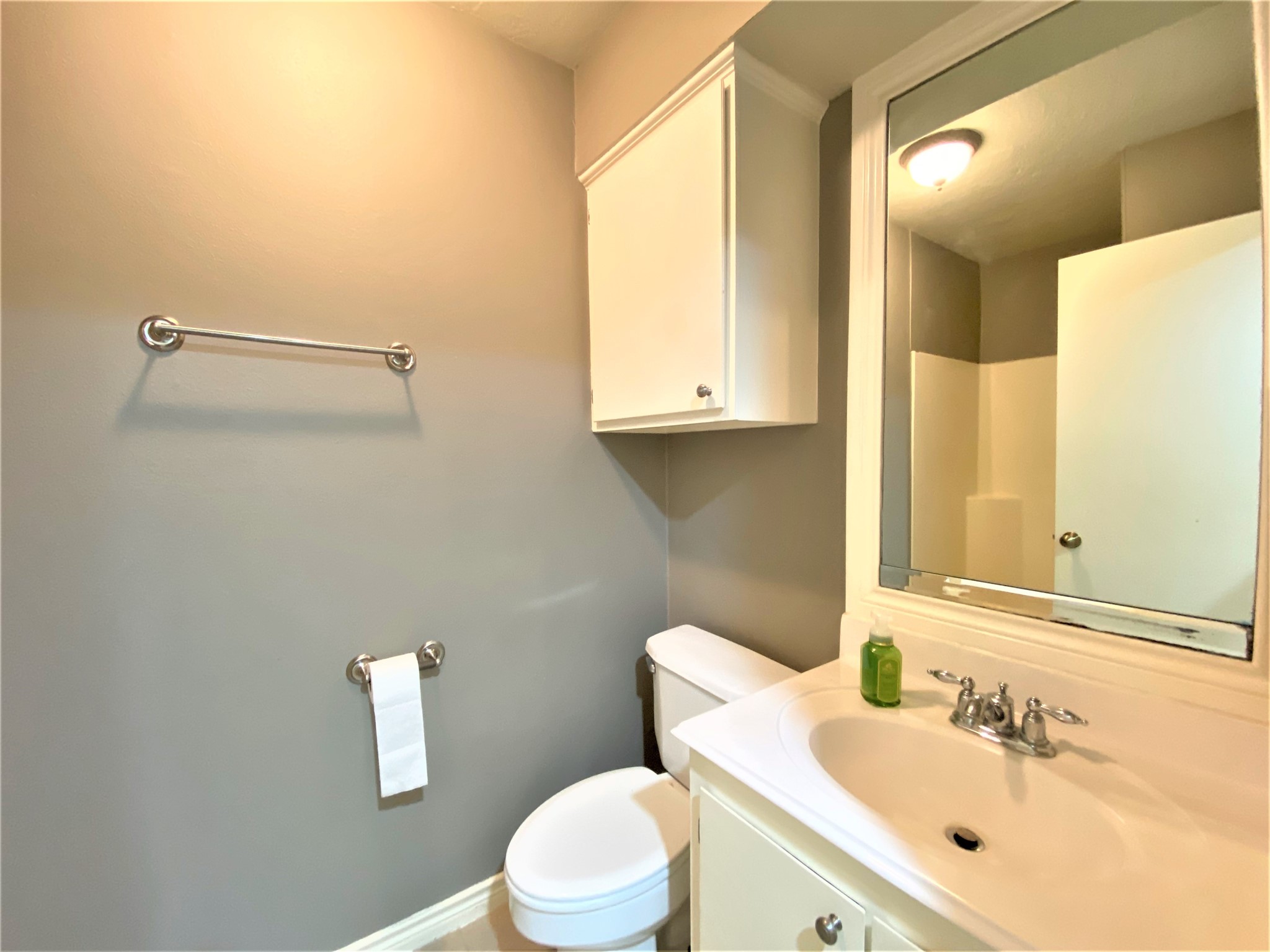 12303 Longfellow Drive Montgomery, TX 77356 - Photo 15 of 26 a bathroom with a sink mirror vanity and toilet