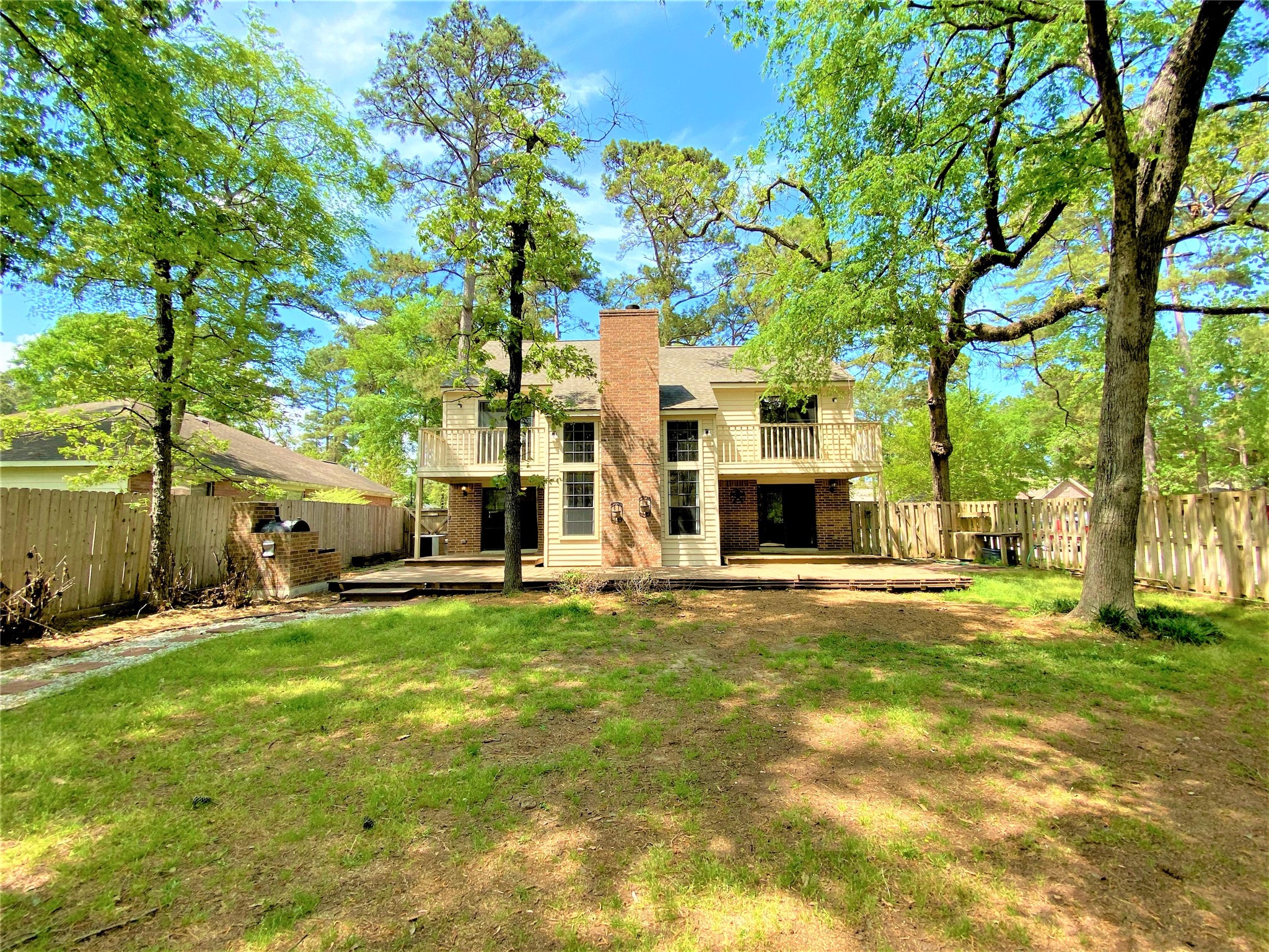 12303 Longfellow Drive Montgomery, TX 77356 - Photo 26 of 26 a view of a house with a yard and tree s