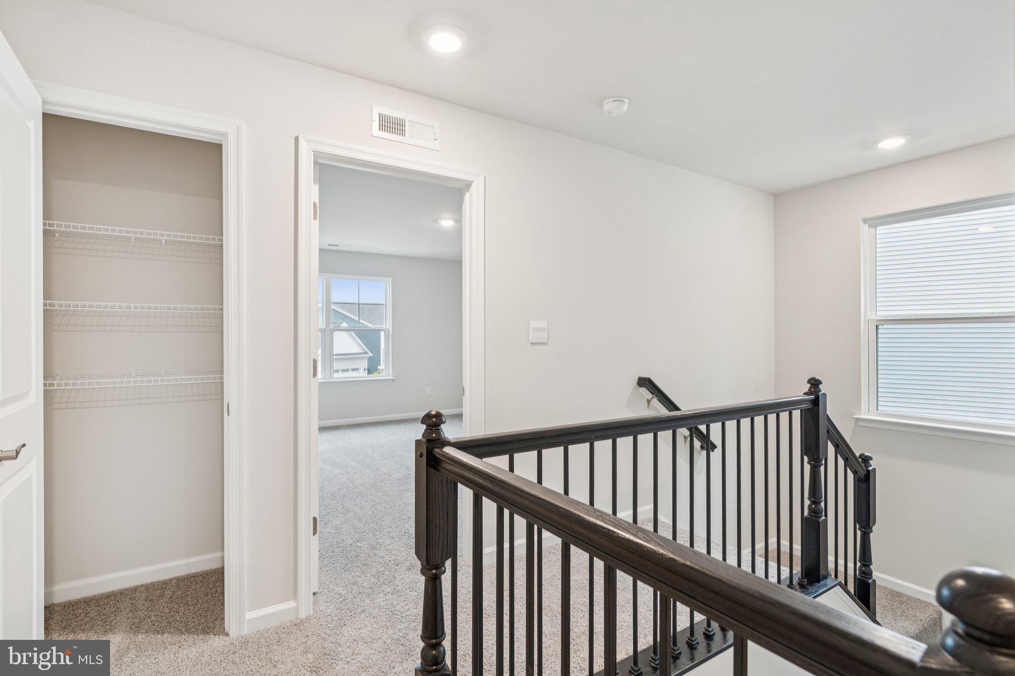 6278 Sterling Way Ruther Glen, VA 22546 - Photo 14 of 32 a view of a hallway with a bedroom