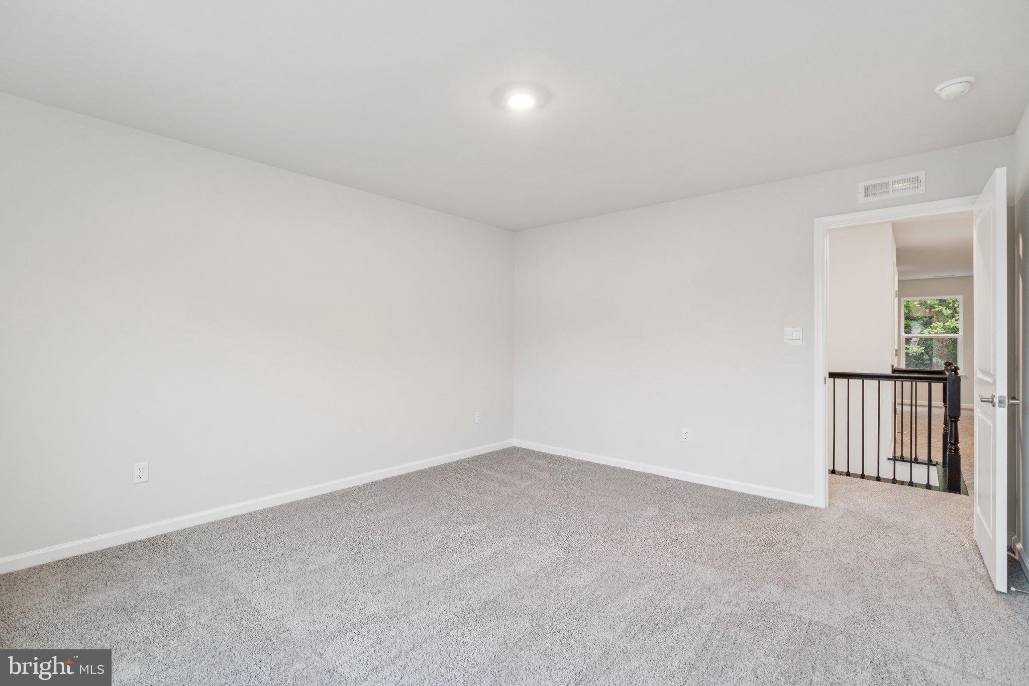 6278 Sterling Way Ruther Glen, VA 22546 - Photo 17 of 32 an empty room with windows