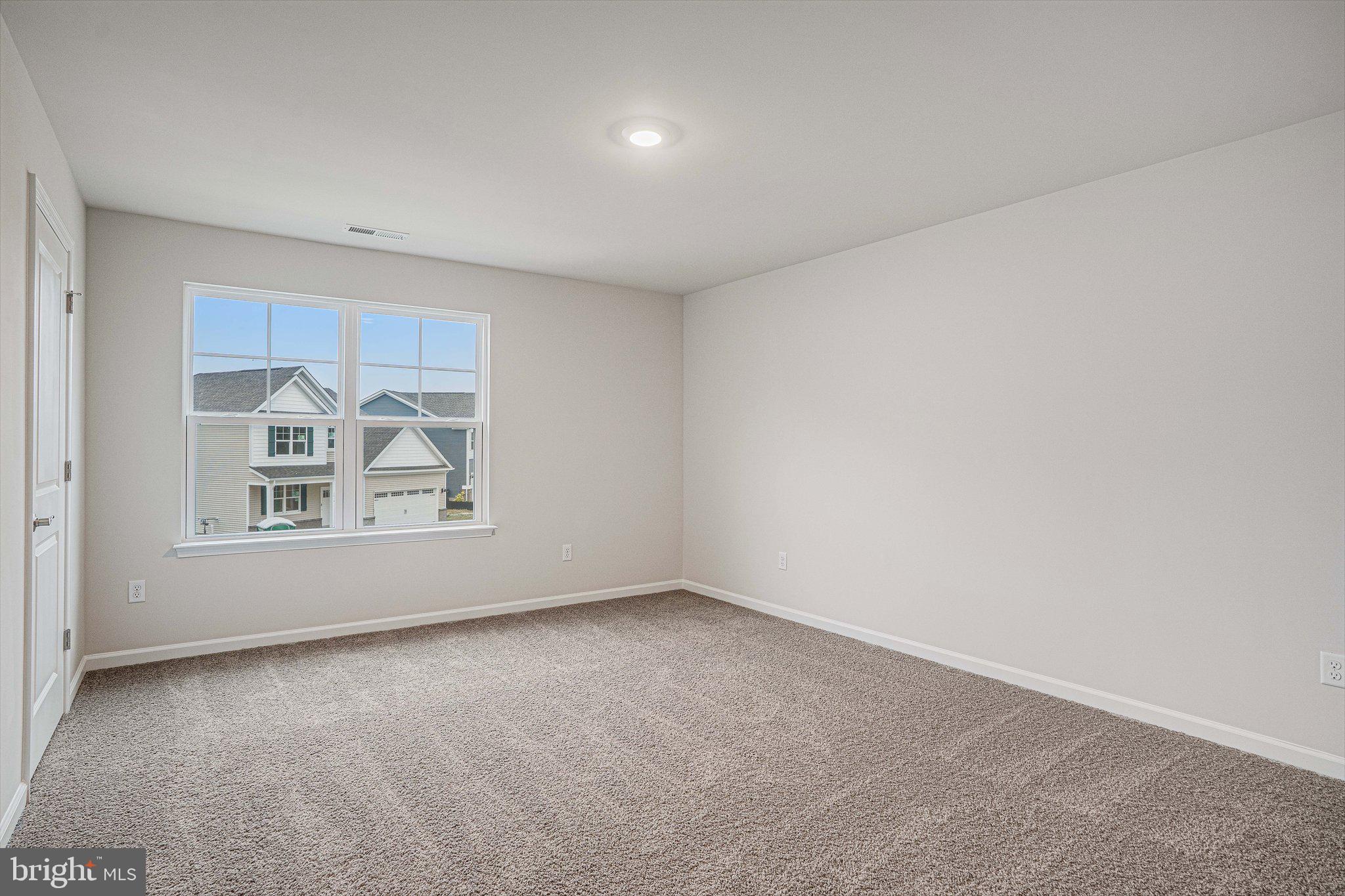 6278 Sterling Way Ruther Glen, VA 22546 - Photo 25 of 32 an empty room with windows