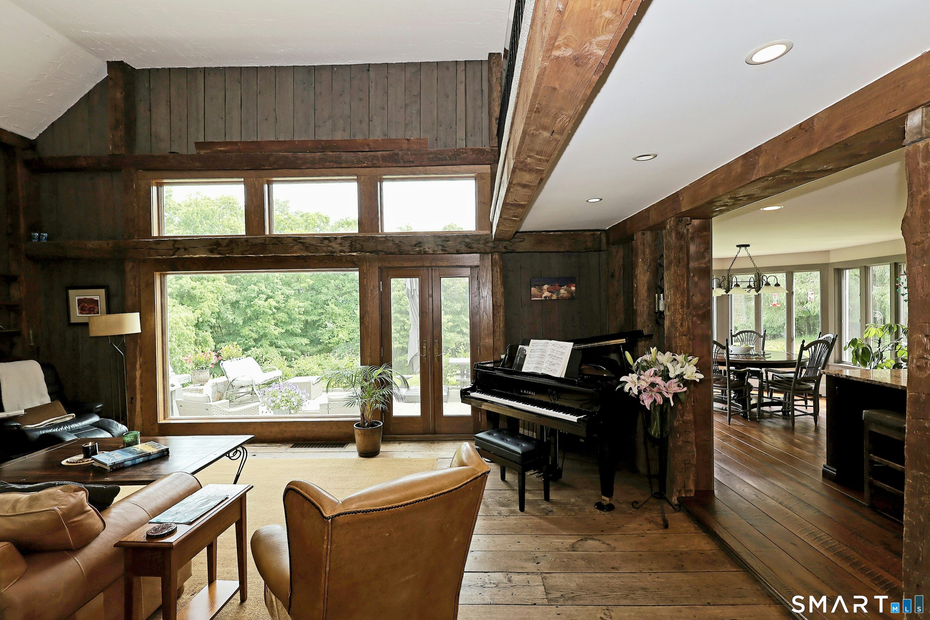 68 Bloomer Road Ridgefield, CT 06877 - Photo 11 of 40 a living room with furniture a rug and a large window