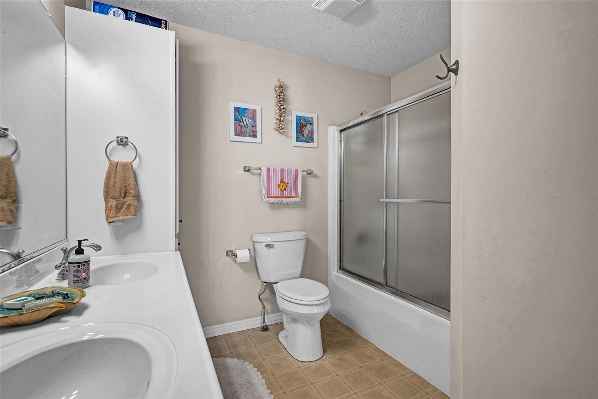 204 Field Drive Normal, IL 61761 - Photo 14 of 34 a bathroom with a sink and a toilet