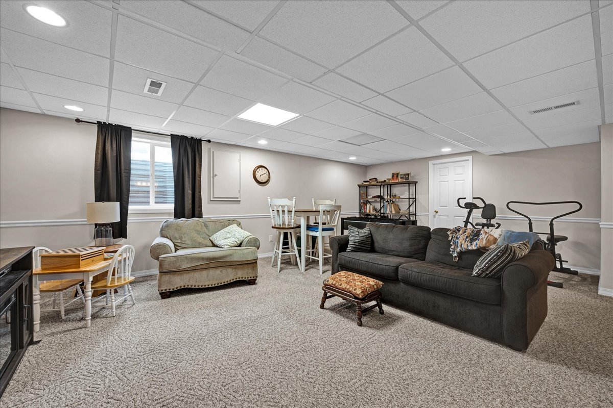 204 Field Drive Normal, IL 61761 - Photo 21 of 34 a living room with furniture and a large window