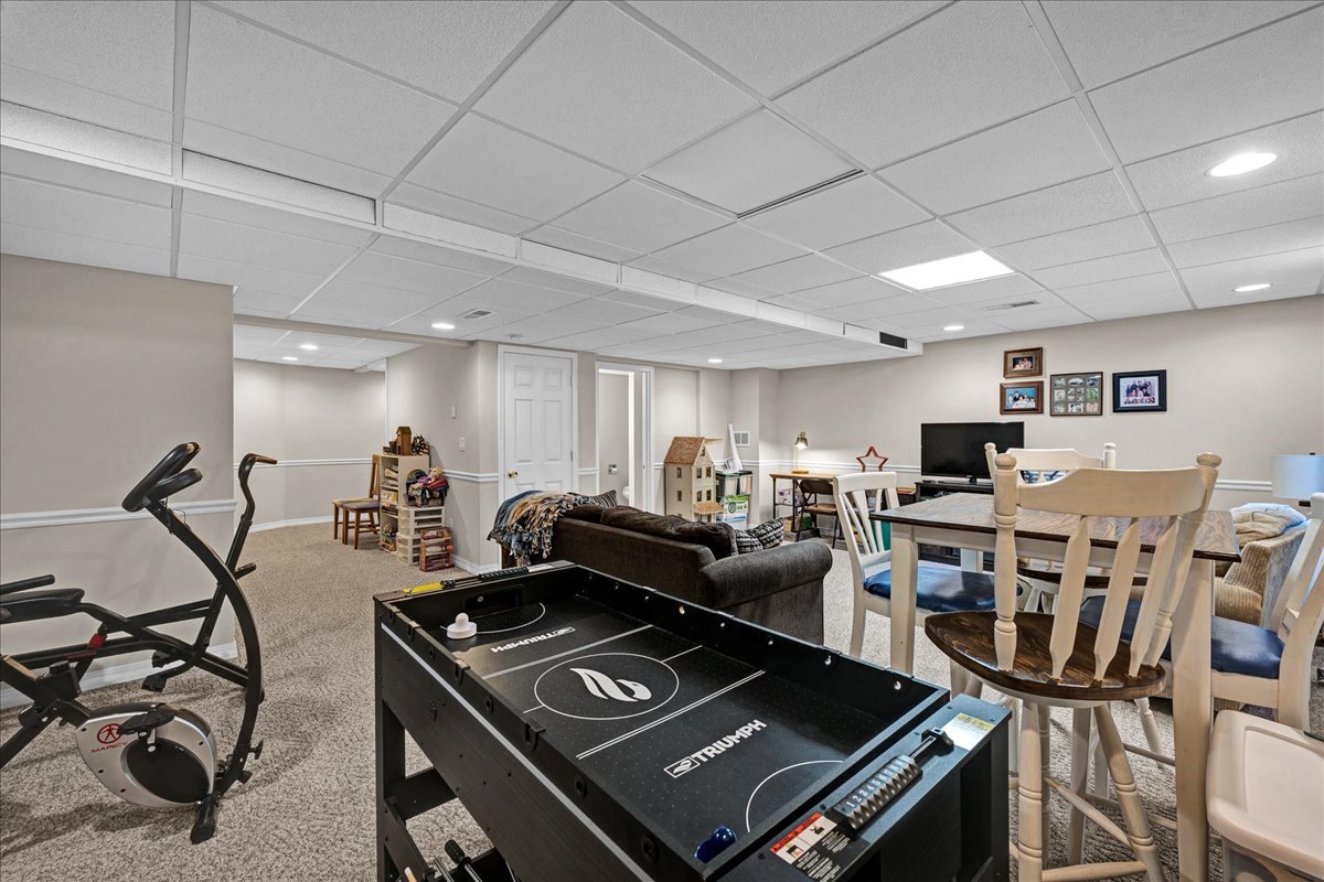 204 Field Drive Normal, IL 61761 - Photo 22 of 34 a view of a room with gym equipment