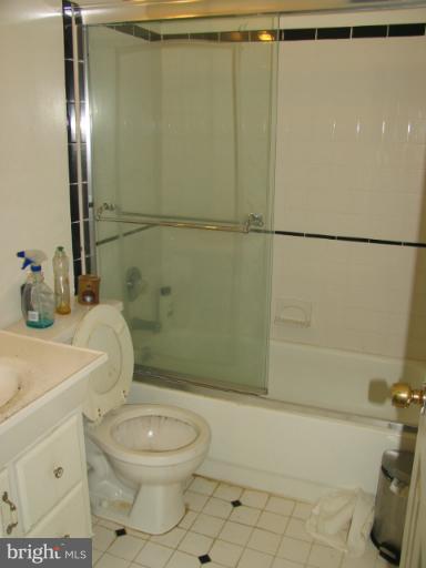 1600 Golf Course Drive Bowie, MD 20721 - Photo 15 of 21 a bathroom with a toilet and a shower