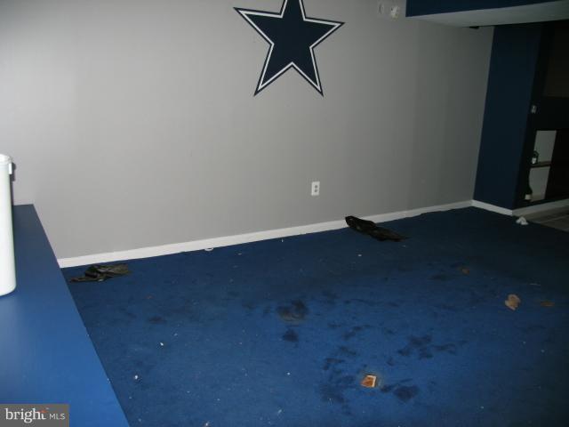 1600 Golf Course Drive Bowie, MD 20721 - Photo 21 of 21 a view of a room with wooden floor and a window